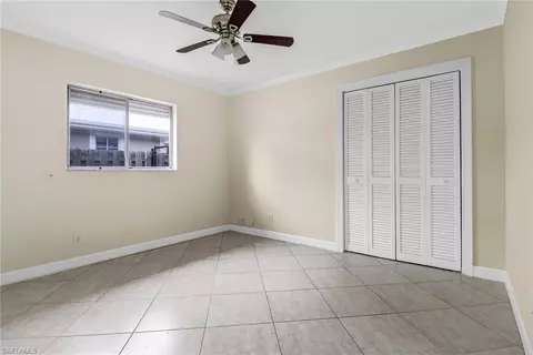 Bedroom - 605 97th Ave N, Naples, FL 34108 photo 5 of 7