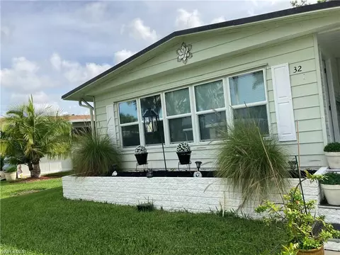 Exterior - 32 Le Mans Dr, Naples, FL 34112 photo 5 of 18