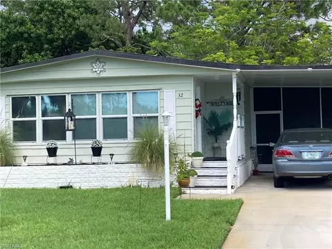 Exterior - 32 Le Mans Dr, Naples, FL 34112 photo 2 of 18