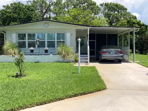 Exterior - 32 Le Mans Dr, Naples, FL 34112 photo 4 of 18