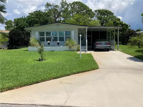 Exterior - 32 Le Mans Dr, Naples, FL 34112 photo 7 of 18