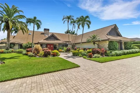 13024 Bald Cypress Ln, Naples, FL 34119