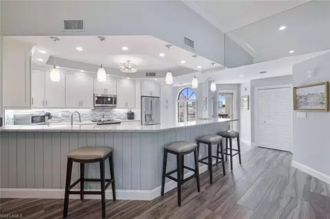 7048 Pelican Bay Blvd #305, Naples, FL 34108