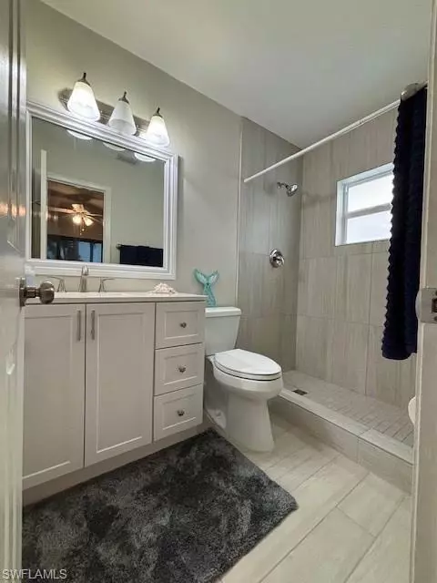 Bath - 655 106th Ave N, Naples, FL 34108 photo 2 of 2