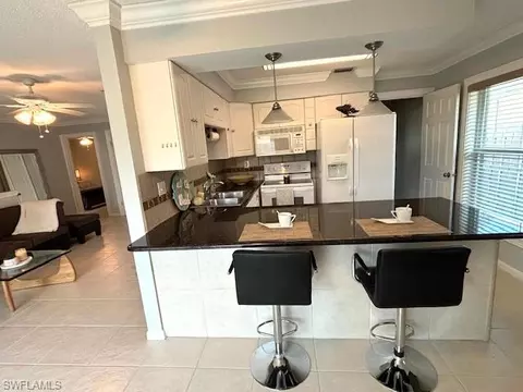 Kitchen - 655 106th Ave N, Naples, FL 34108 photo 5 of 6