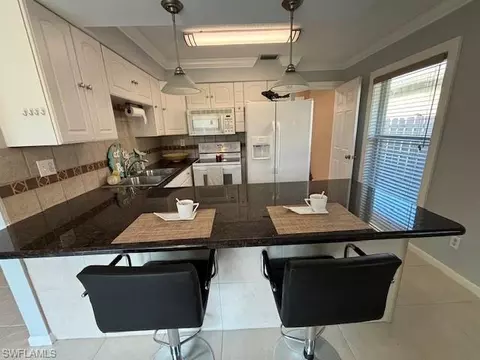 Kitchen - 655 106th Ave N, Naples, FL 34108 photo 2 of 6