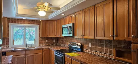 Kitchen - 3295 70th St SW, Naples, FL 34105 photo 2 of 3