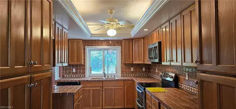 Kitchen - 3295 70th St SW, Naples, FL 34105 photo 1 of 3