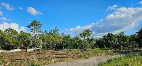 Exterior - 3295 70th St SW, Naples, FL 34105 photo 4 of 12