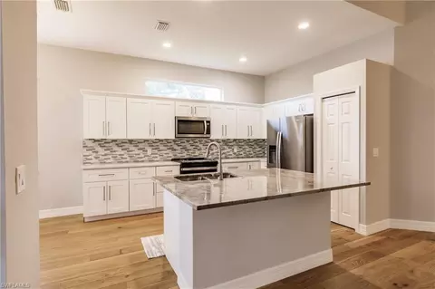 389 Harvard Ct, Naples, FL 34104 photo 11
