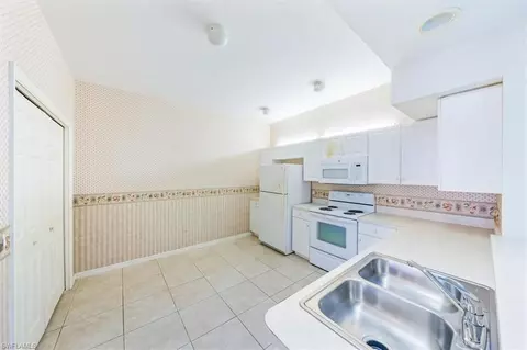 Kitchen - 331 Dover Pl #G-103, Naples, FL 34104 photo 2 of 4