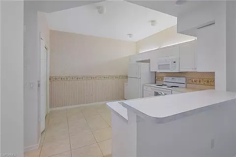 Kitchen - 331 Dover Pl #G-103, Naples, FL 34104 photo 1 of 4