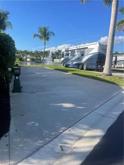 13477 Ladyfish Ln, Naples, FL 34114