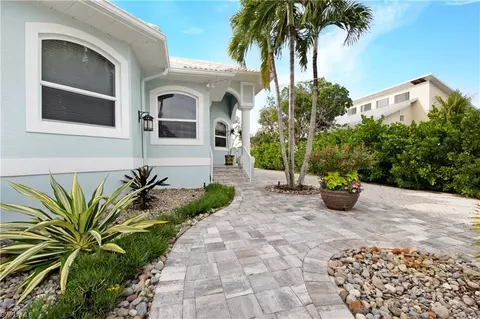 Exterior - 412 Luzon Ave, Naples, FL 34113 photo 2 of 11