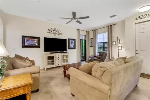 Living - 8941 Malibu St #103, Naples, FL 34113 photo 2 of 6