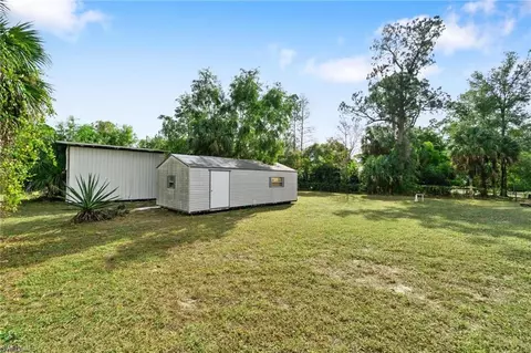Exterior - 690 14th St SE, Naples, FL 34117 photo 9 of 10