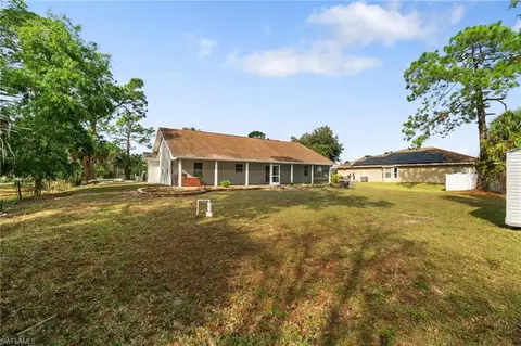 Exterior - 690 14th St SE, Naples, FL 34117 photo 7 of 10