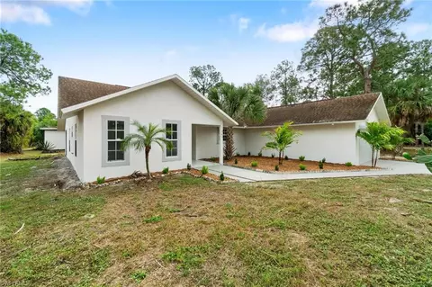 Exterior - 690 14th St SE, Naples, FL 34117 photo 3 of 10