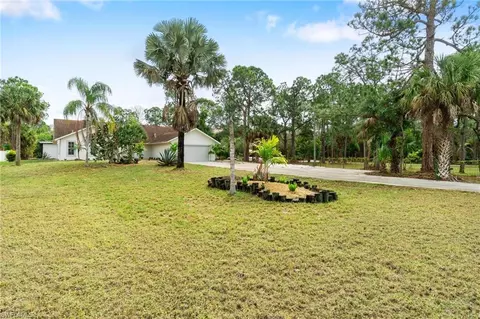 Exterior - 690 14th St SE, Naples, FL 34117 photo 4 of 10