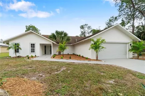 Exterior - 690 14th St SE, Naples, FL 34117 photo 2 of 10
