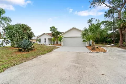 Exterior - 690 14th St SE, Naples, FL 34117 photo 1 of 10