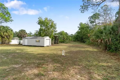 Exterior - 690 14th St SE, Naples, FL 34117 photo 5 of 10