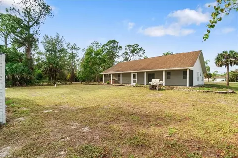 Exterior - 690 14th St SE, Naples, FL 34117 photo 8 of 10
