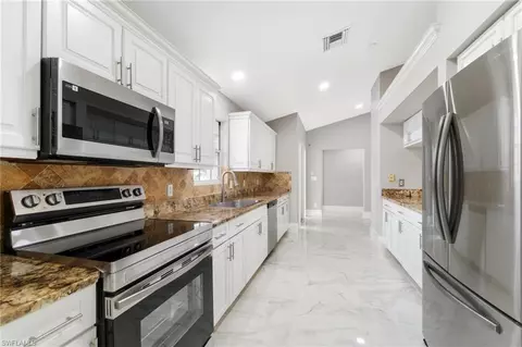Kitchen - 690 14th St SE, Naples, FL 34117 photo 2 of 4