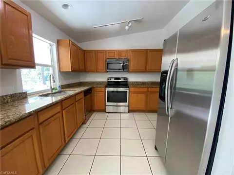 5440 Teak Wood Dr, Naples, FL 34119