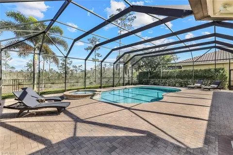 Exterior - 3280 Atlantic Cir, Naples, FL 34119 photo 6 of 12