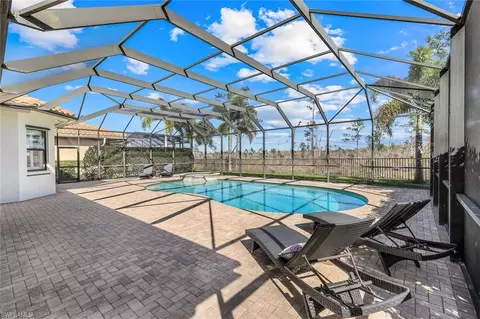 Exterior - 3280 Atlantic Cir, Naples, FL 34119 photo 4 of 12