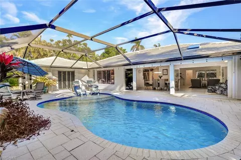 Exterior - 735 Old Trail Dr, Naples, FL 34103 photo 4 of 14