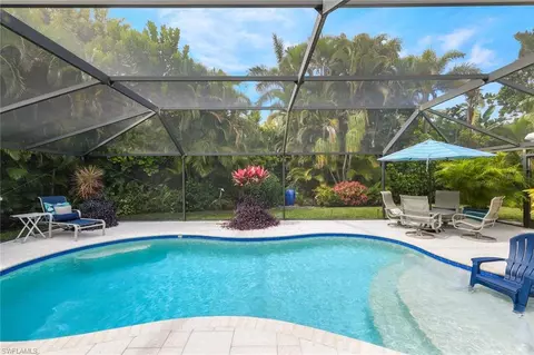 Exterior - 735 Old Trail Dr, Naples, FL 34103 photo 11 of 14