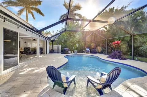 Exterior - 735 Old Trail Dr, Naples, FL 34103 photo 6 of 14