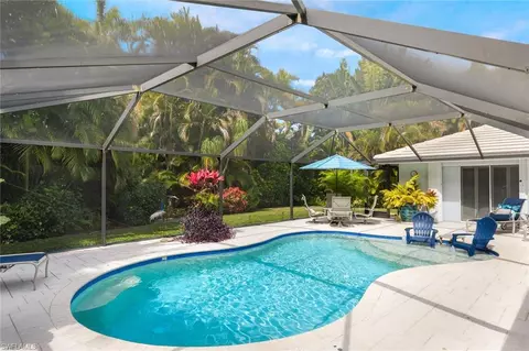 Exterior - 735 Old Trail Dr, Naples, FL 34103 photo 9 of 14