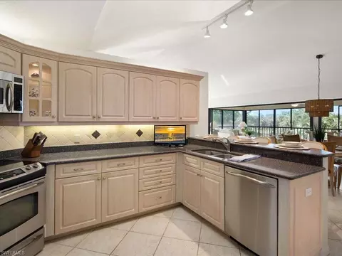 Kitchen - 770 Eagle Creek Dr #301, Naples, FL 34113 photo 4 of 4