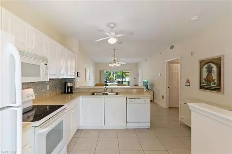 Kitchen - 9185 Celeste Dr #1-106, Naples, FL 34113 photo 2 of 2