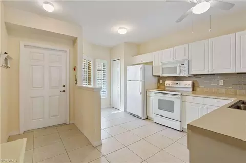 Kitchen - 9185 Celeste Dr #1-106, Naples, FL 34113 photo 1 of 2