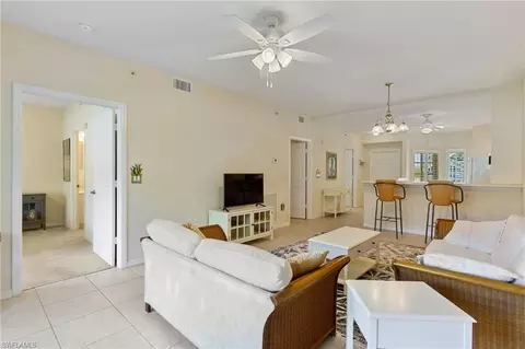 Living - 9185 Celeste Dr #1-106, Naples, FL 34113 photo 2 of 2