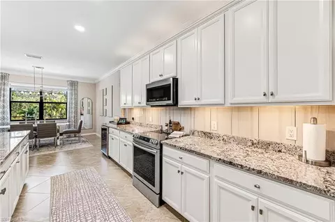 Kitchen - 4686 Abaca Cir, Naples, FL 34119 photo 5 of 6
