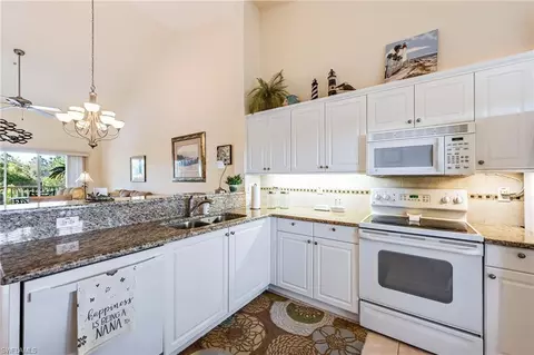 Kitchen - 9175 Celeste Dr #2-403, Naples, FL 34113 photo 2 of 2