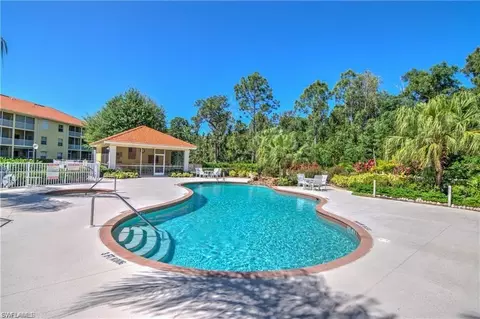 Exterior - 9175 Celeste Dr #2-403, Naples, FL 34113 photo 1 of 6