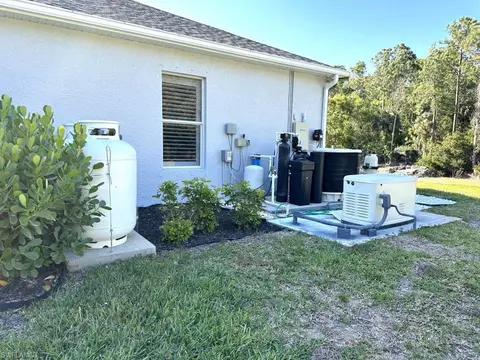 Exterior - 5655 Cedar Tree Ln, Naples, FL 34116 photo 10 of 11