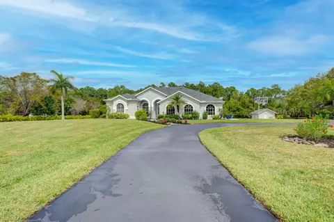Exterior - 5655 Cedar Tree Ln, Naples, FL 34116 photo 7 of 11
