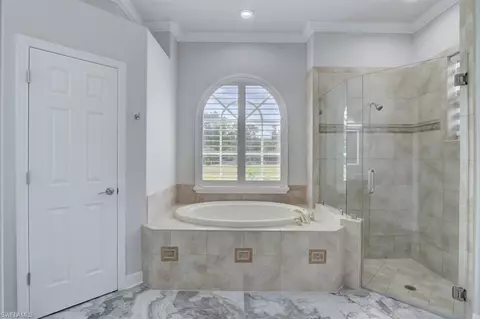 Bath - 5655 Cedar Tree Ln, Naples, FL 34116 photo 1 of 3