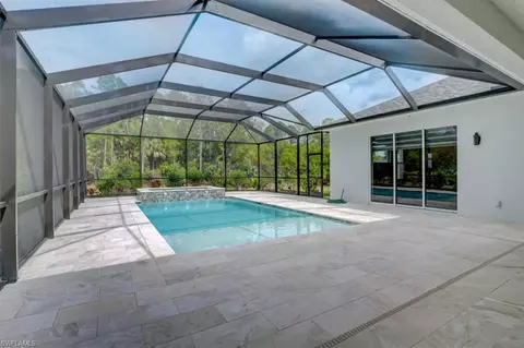 Exterior - 5655 Cedar Tree Ln, Naples, FL 34116 photo 6 of 11