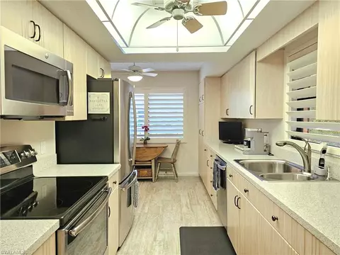 Kitchen - 1170 Cherrystone Ct #1, Naples, FL 34102 photo 2 of 4