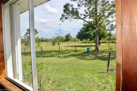 Exterior - 1121 Carson Dr SW, Labelle, FL 33935 photo 8 of 17