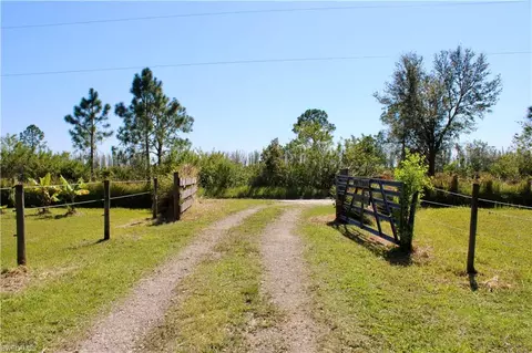 Exterior - 1121 Carson Dr SW, Labelle, FL 33935 photo 3 of 17