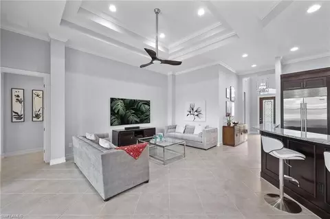 Living - 6582 Amarone Ln, Naples, FL 34113 photo 6 of 7